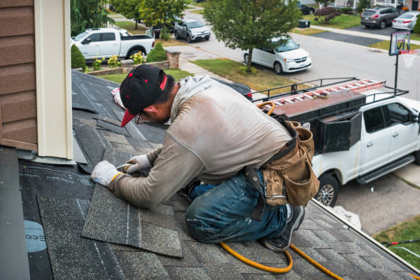 Professional Roof Replacement technician working in Seaside Heights, NJ